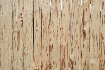 Fototapeta na wymiar background debarked wooden planks