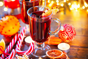 Traditional Christmas mulled wine hot drink. Holiday decorated Christmas table