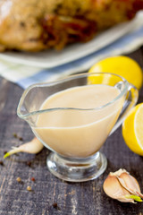 Honey-lemon sauce for marinating poultry, selective focus