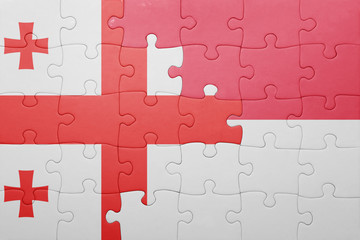 puzzle with the national flag of indonesia and georgia