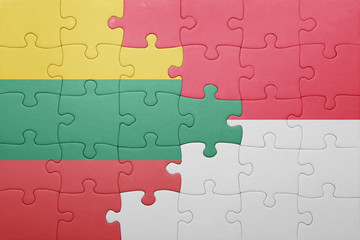 Fototapeta premium puzzle with the national flag of indonesia and lithuania
