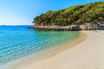 Beautiful sandy Grande Sperone beach with crystal clear turquoise sea water, Corsica island, France