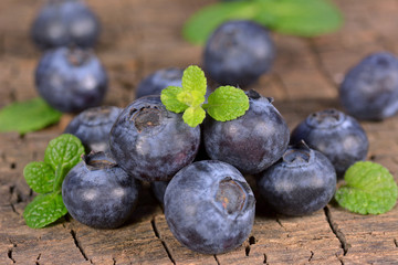 Fresh blueberries with mint leaves
