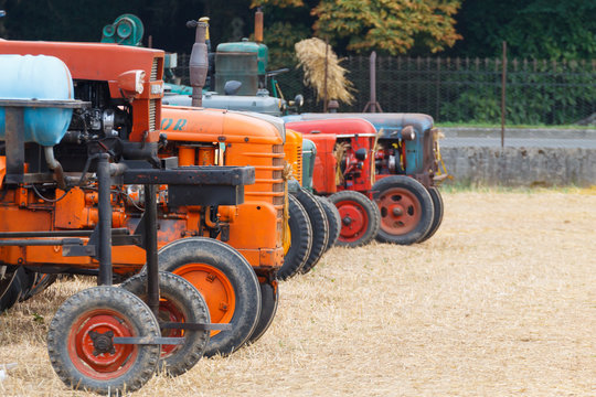 Detail of old tractors in perspective, agricultural vehicle, rural life