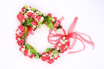 wreath with red roses isolated on white