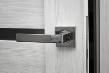 door ajar and door handle close up