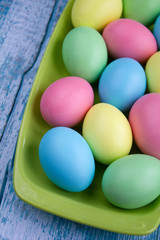 Easter eggs on a green plate