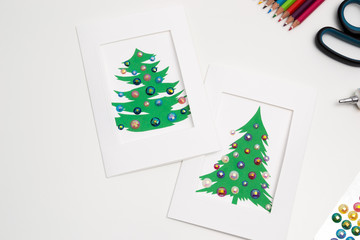 Decorated Christmas cards. Handmade New Year decorations