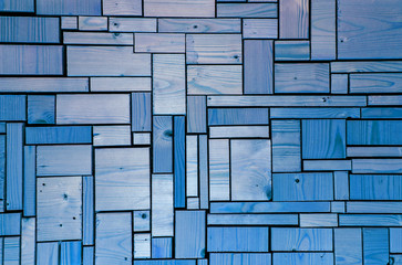 Imagination - blue wooden background with block abstract grids.