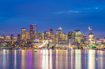 scenic view of Seattle city in the night time with reflection of