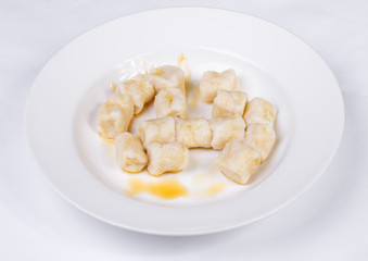 Lazy dumplings of cottage cheese with sour cream
