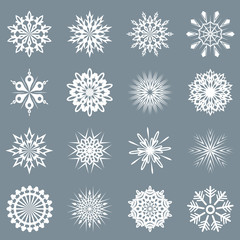 Abstract white snowflake shapes vector set isolated on grey back