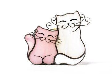 glass figurines of love cats isolated on white