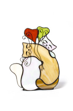 glass figurines of love cats isolated on white