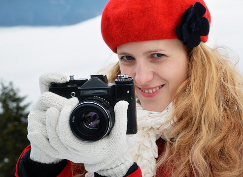 Woman with camera, outdoor