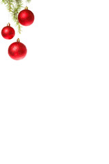 Christmas decoration with red ornamentals and green fir tree on