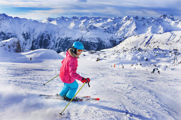 Fototapeta na wymiar Girl skier in winter resort