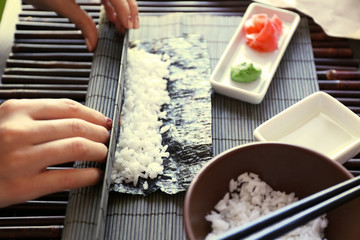 The process of making sushi and rolls