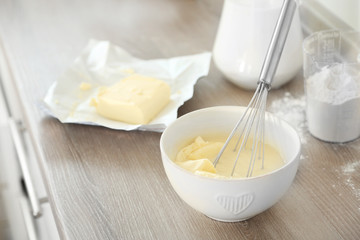 Cooking buttery cream on kitchen