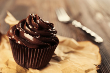 Chocolate cupcakes on craft paper