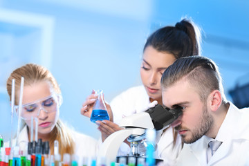 Young medical technicians working in laboratory