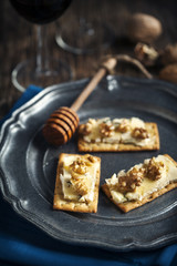 Blue Cheese and Walnut Crackers with honey