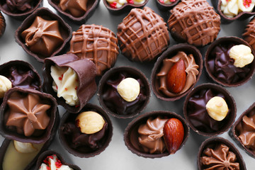 Delicious chocolate candies background, close up