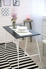 Modern dining room interior in black and white tones