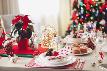 Christmas table setting on light room background