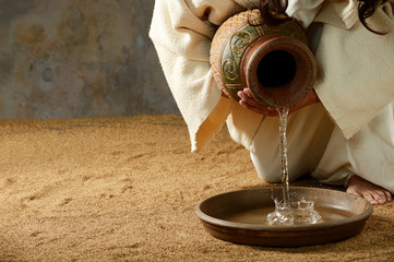 Naklejka premium Jesus pouring water from a jar