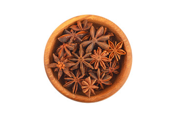 Star anise in wooden bowl