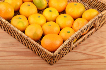Mandarin on wickered tray