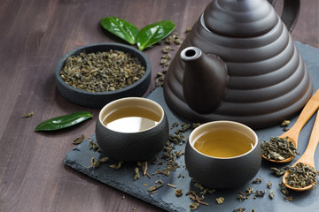 set for tea ceremony on a wooden table, top view