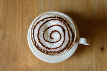 Cup of cocoa with froth milk