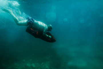 underwater scooter seabob unidentified man dive