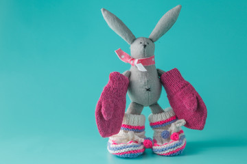 Newborn announcement with knitted bootie