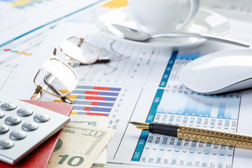 Financial charts and graphs on the table