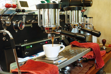 coffee machine preparing cup of coffee.