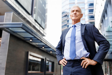 Portrait of confident businessman outdoors