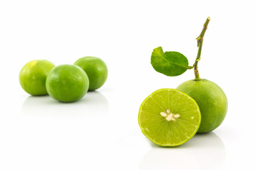 Limes whole and slices.