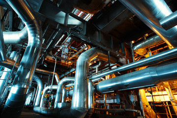 different size and shaped pipes and valves at a power plant