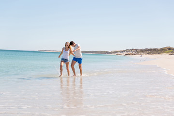 Romantic young couple on the beach