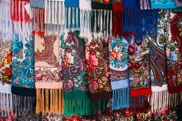 Rows of Russian colorfull scarfs and headscarfs