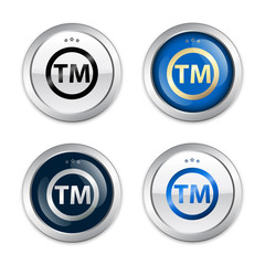 Registered trademark seals or icons. Glossy silver seals or buttons.