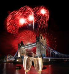 Toasting with champagne against Tower Bridge in London, England