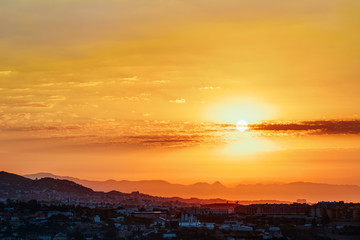 Beautiful Sunset Sunrise Over Mountain and city