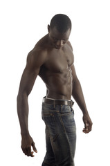 Fototapeta premium A black man with a muscular body and white background.