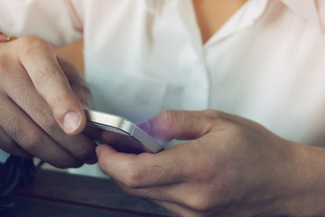 businessman using a mobile phone with texting message