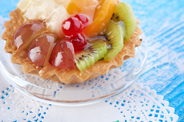 sweet cake with fruits on plate