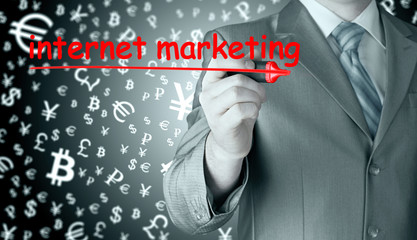 business man writing internet marketing